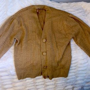 Soft button up sweater, can be worn as a shirt or an over cover, cozy and warm